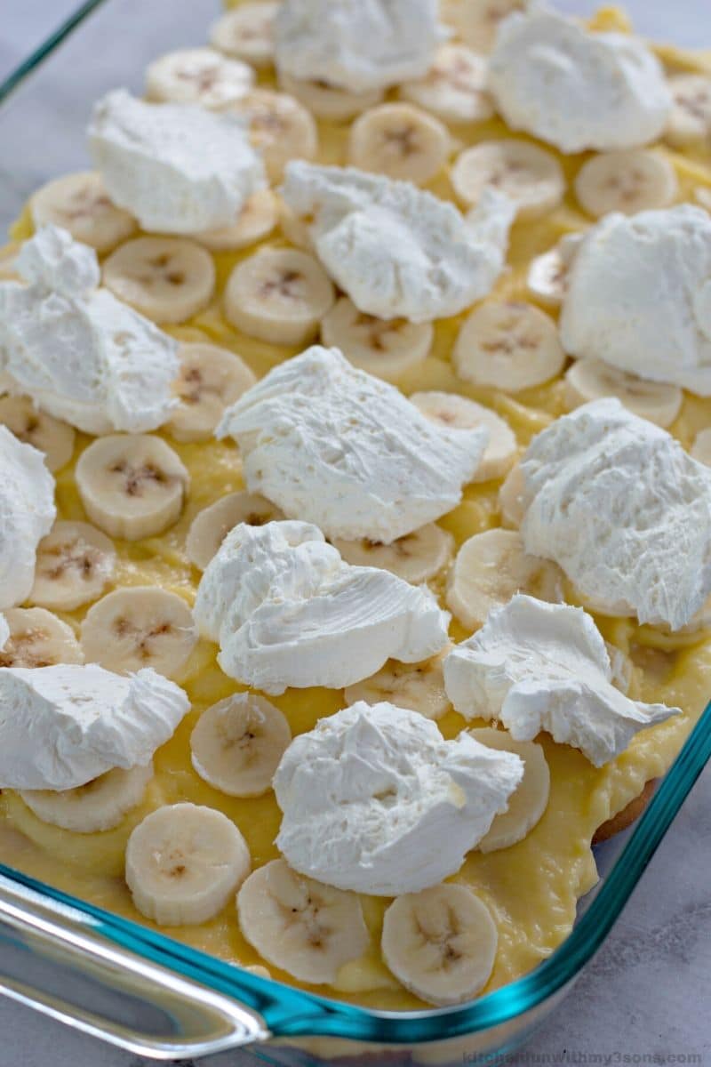 cheesecake layer on top of bananas and pudding