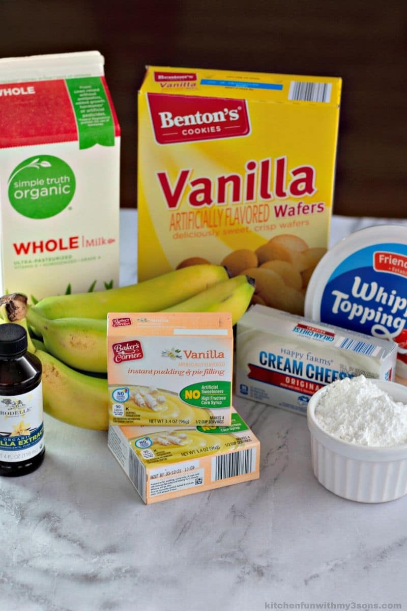 Ingredients for banana pudding arranged on a work surface.