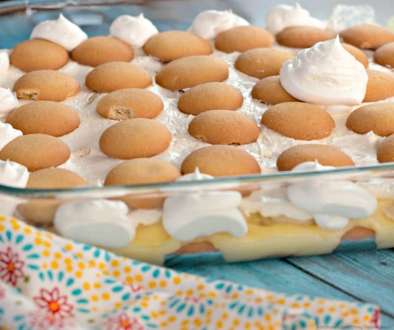 Side view of a baking dish filled with Nilla wafer banana pudding.