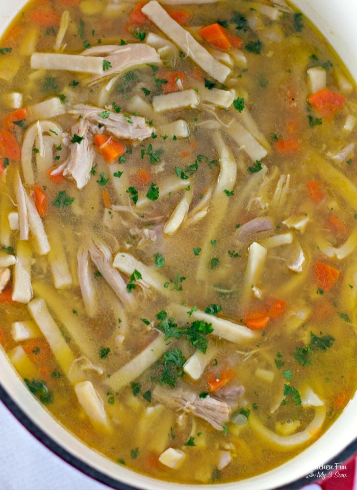 Close-up of a pot of homemade chicken noodle soup with egg noodles