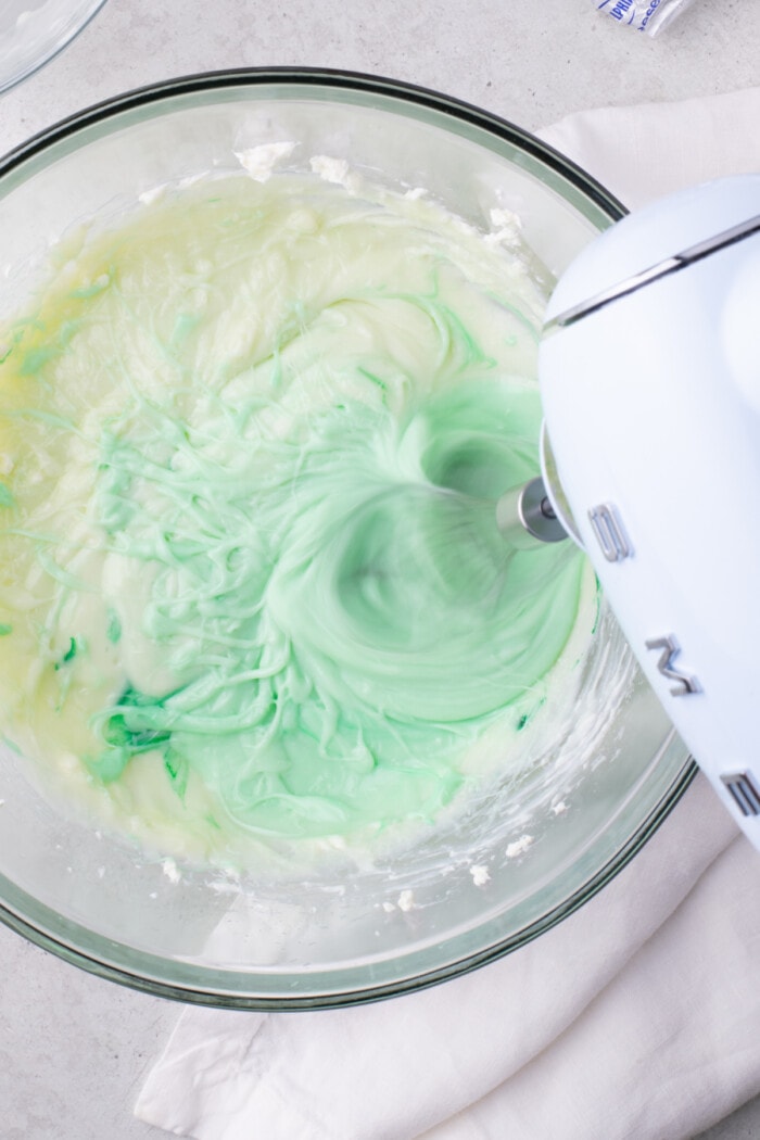 mixing mint frosting