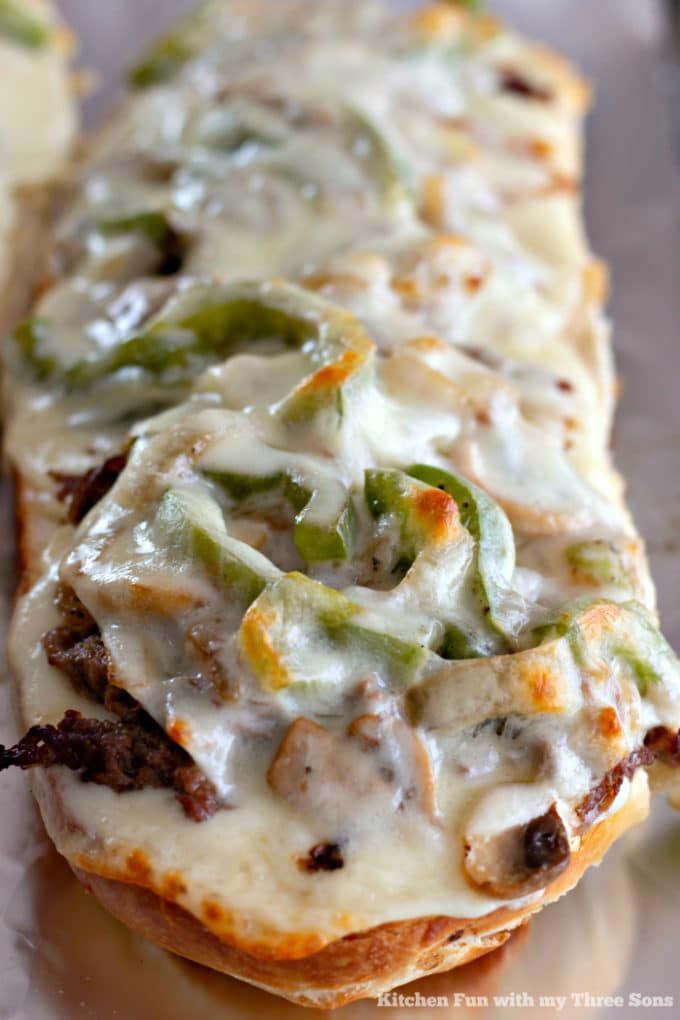 Philly Cheesesteak Cheese Bread on a foil-lined baking sheet