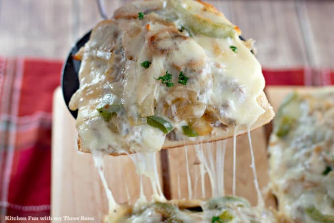 Cheesy baked bread with meat and vegetables