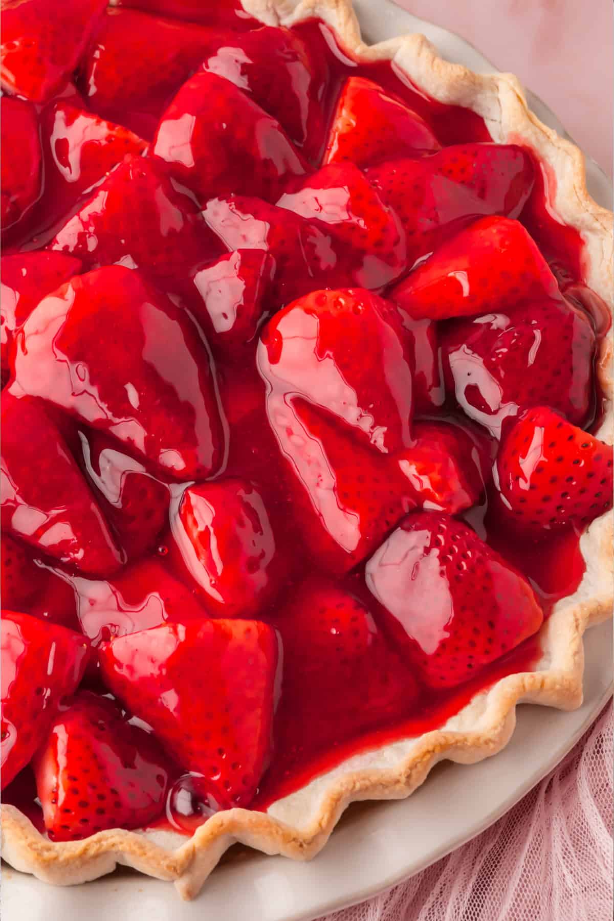 This easy No Roll Pie Crust is the simplest way to make a homemade pie crust without a rolling pin! Strawberry pie with a No Roll Pie Crust