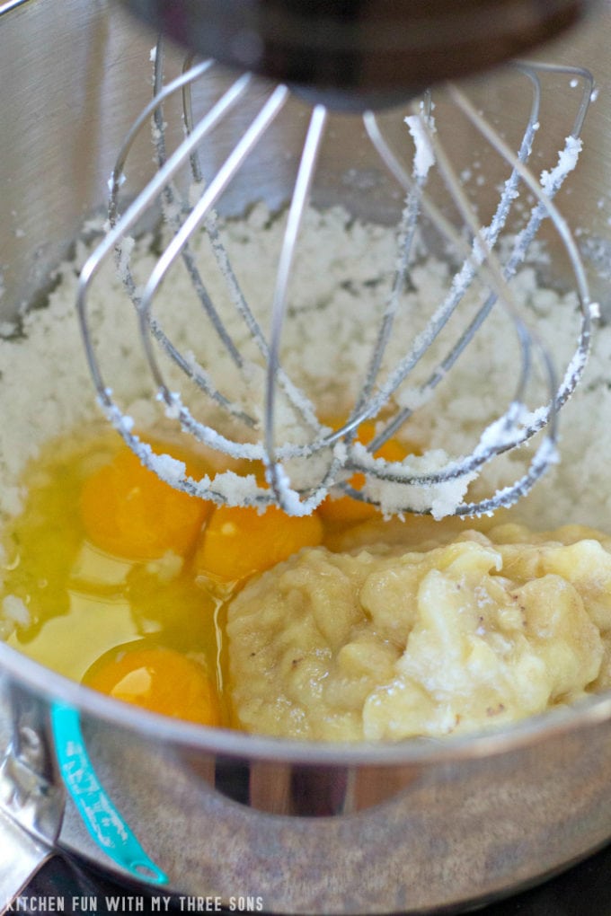 beating shortening, sugar, eggs, and bananas in a KitchenAid