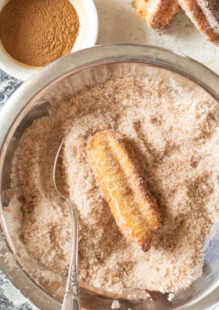 These Churros are soft on the inside, crisp and golden brown on the outside, and tossed with cinnamon sugar. Coating a churro in cinnamon sugar