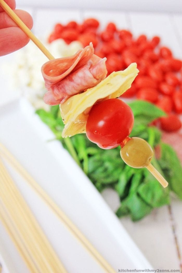loading ingredients on a skewer