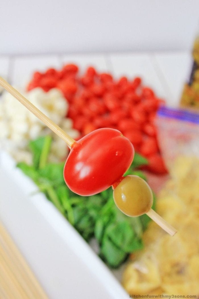 loading ingredients on a skewer