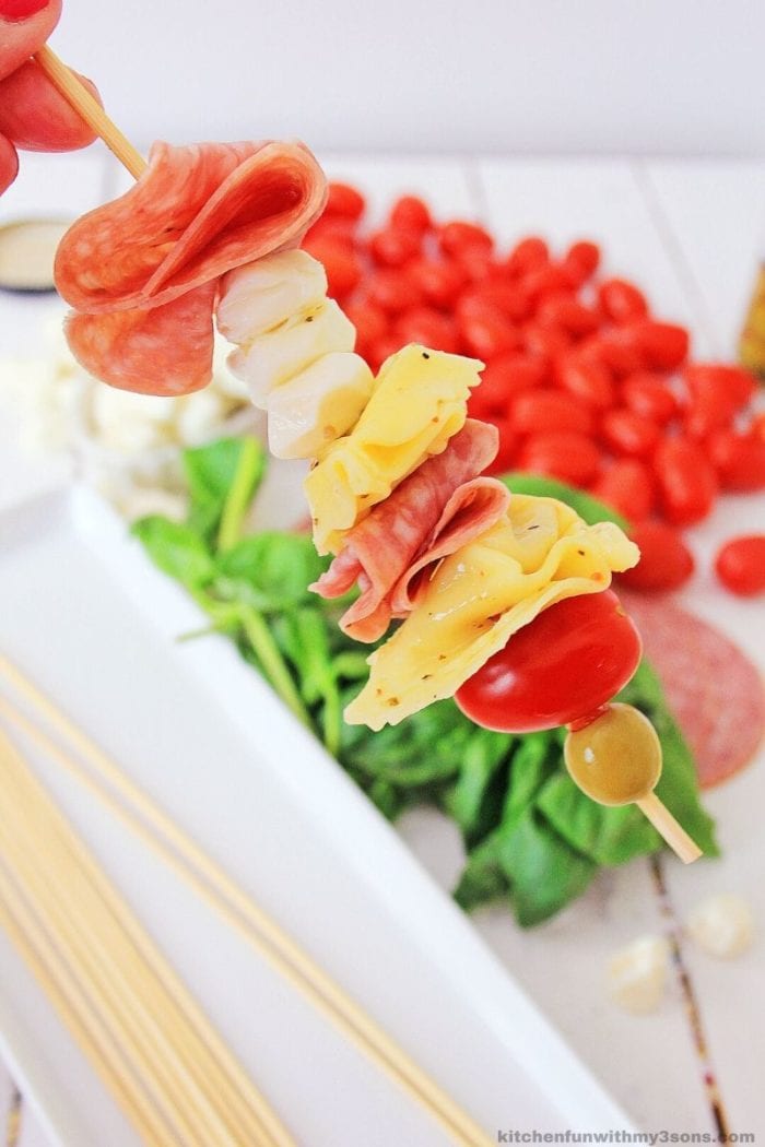 loading ingredients on a skewer
