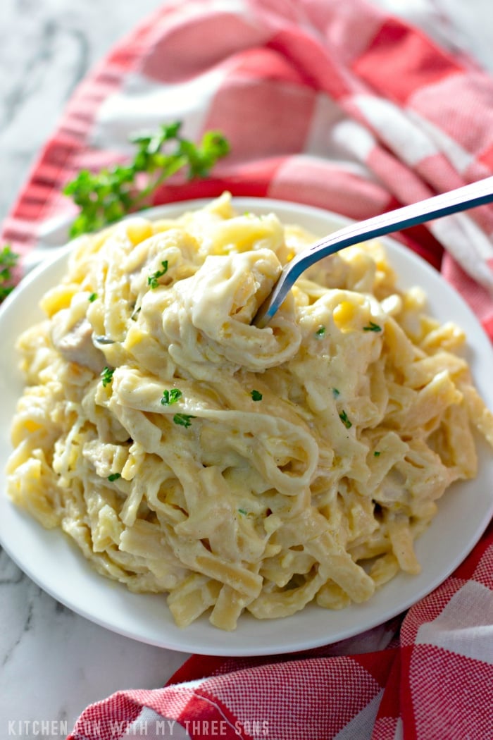 Chicken Tetrazzini on a plate with a fork.