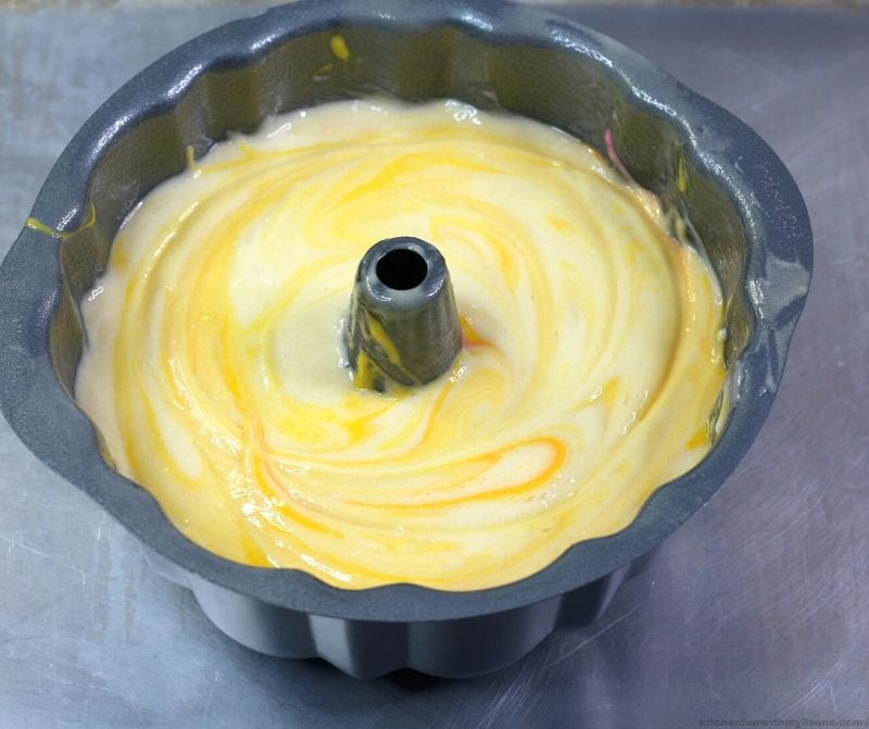 yellow cake batter in a pan