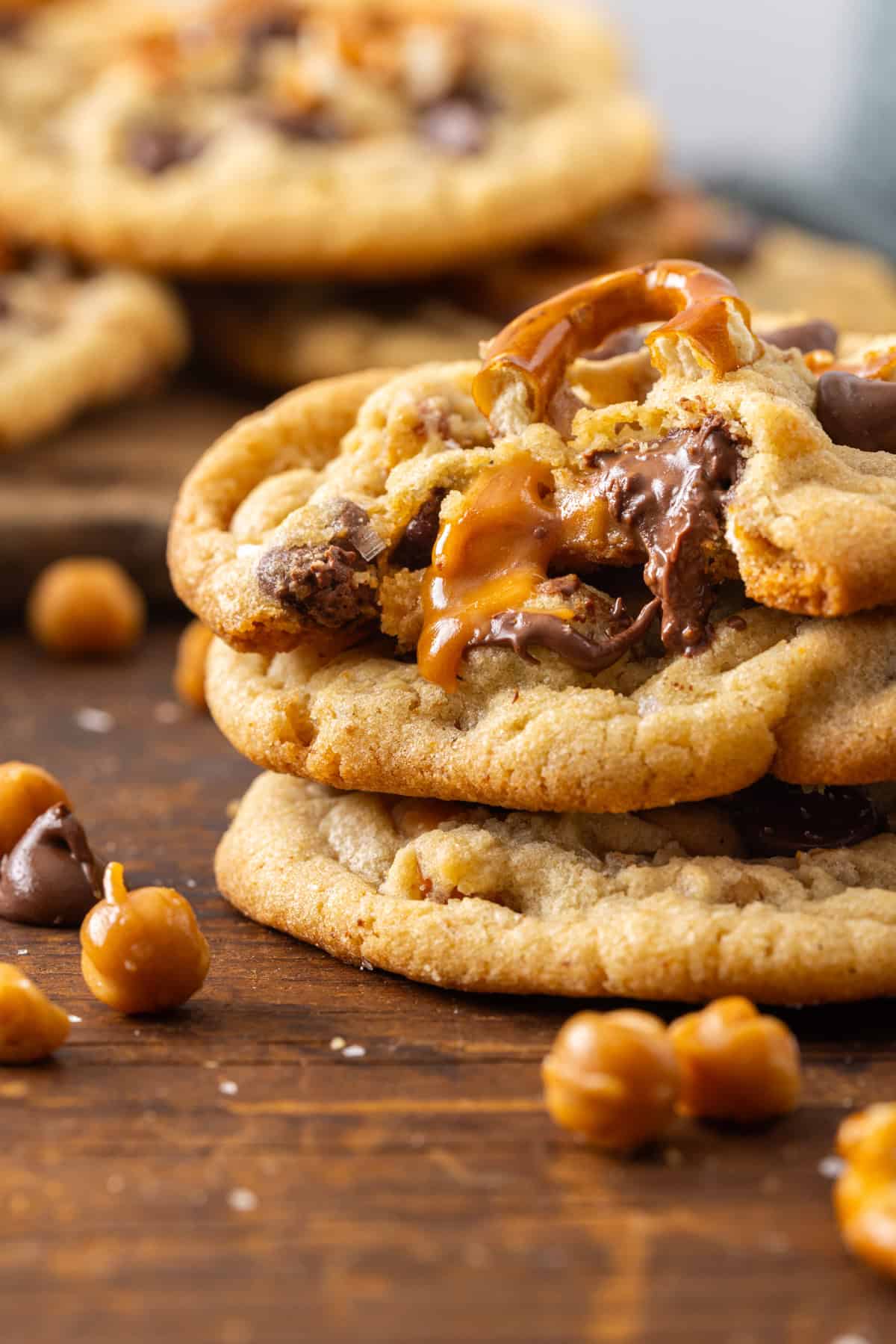 Made with brown butter, pretzels, caramel bits, and chocolate chips, Kitchen Sink Cookies are the perfect combination of sweet and salty. A stack of 3 kitchen sink cookies