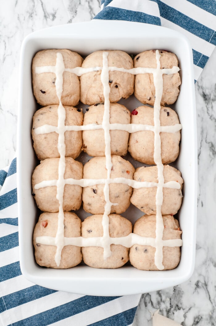 Crosses added to the top of hot cross bun dough balls