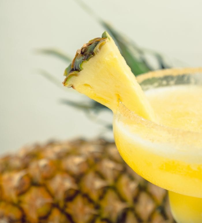pineapple slice on the rim of a glass