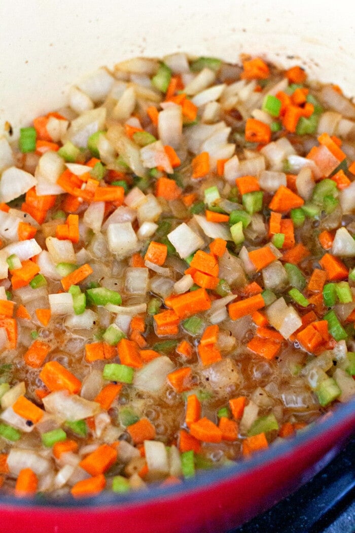 Diced carrots, celery, and onion in a soup pot