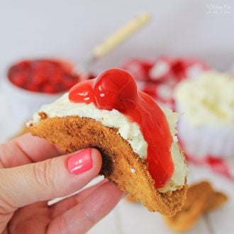 Cheesecake Tacos are my new favorite dessert! Made with a cinnamon and sugar shel, filled with homemade cheesecake and topped with cherries.