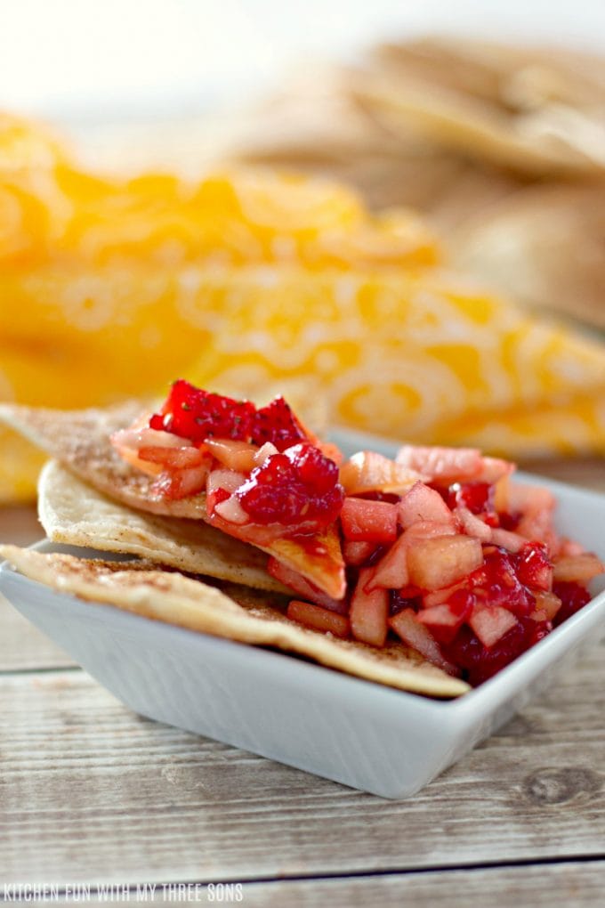 Strawberry Salsa with Cinnamon Tortilla Chips in a small white bowl