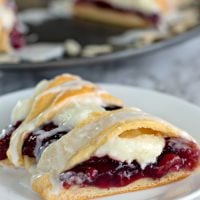 Raspberry Cream Cheese Crescent Ring slice on a plate