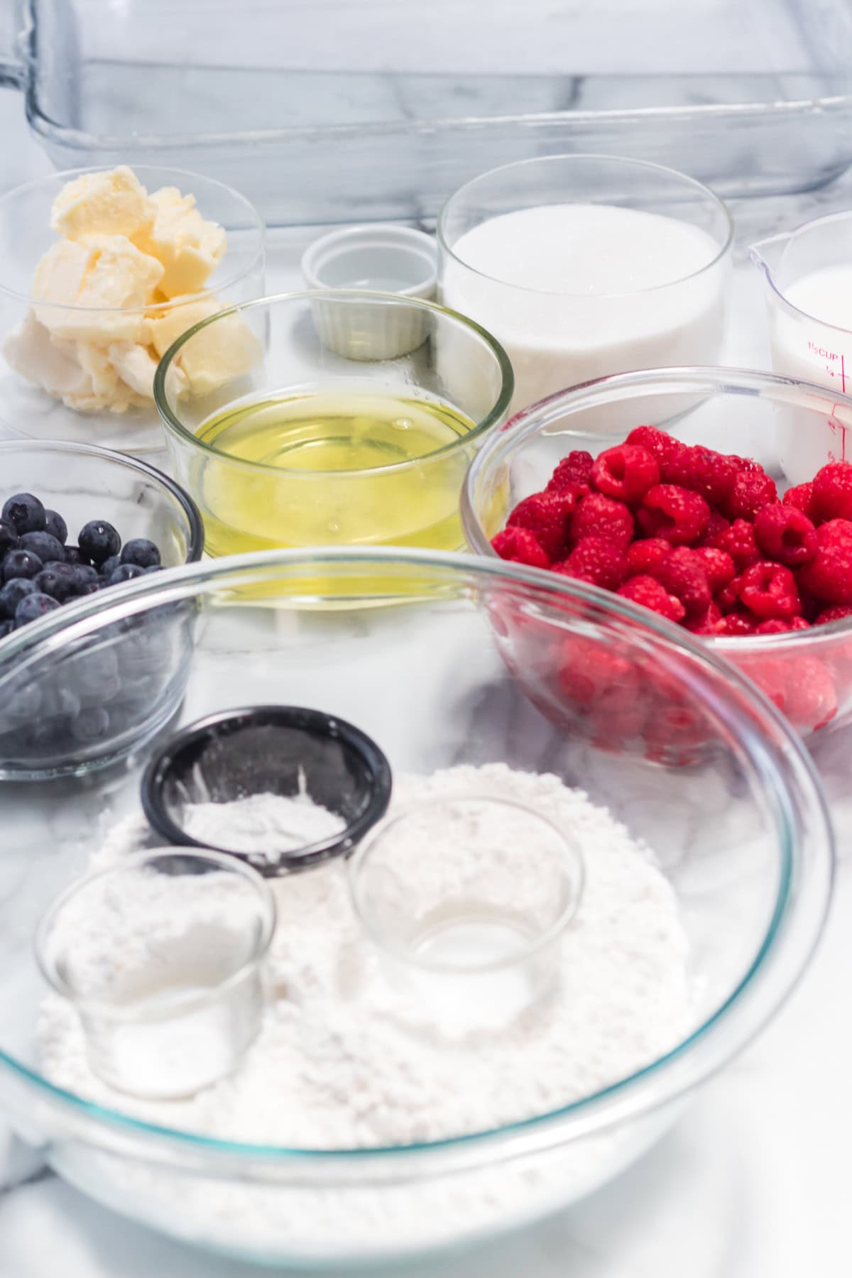 This American Flag Cake Recipe is easy to make and perfect for Memorial Day or 4th of July. ingredients for a white cake with berries