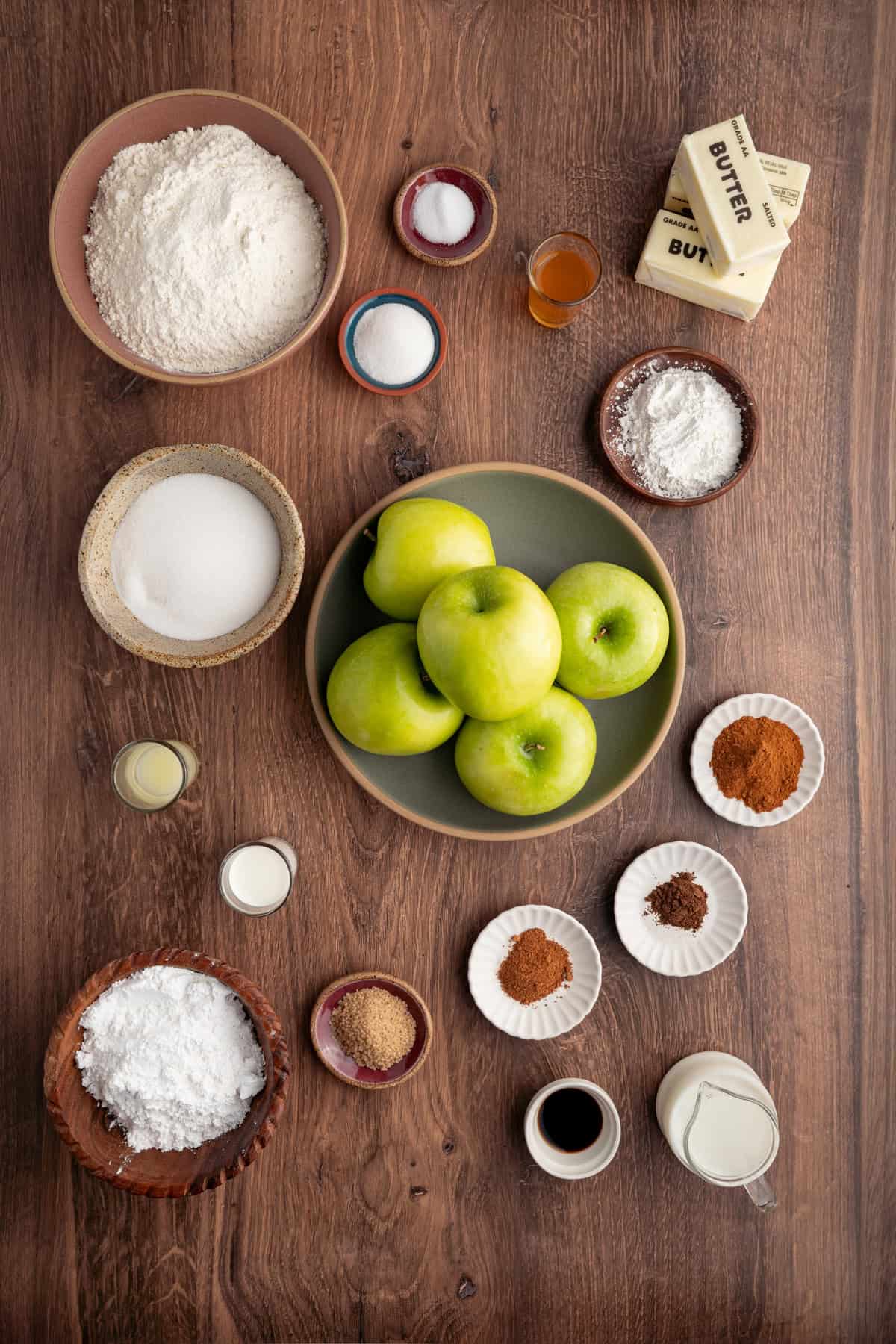 With a flaky, buttery crust and perfectly spiced apple filling baked in a jelly roll pan, Apple Slab Pie is ideal for holidays and gatherings. Overhead view of ingredients needed to make apple slab pie