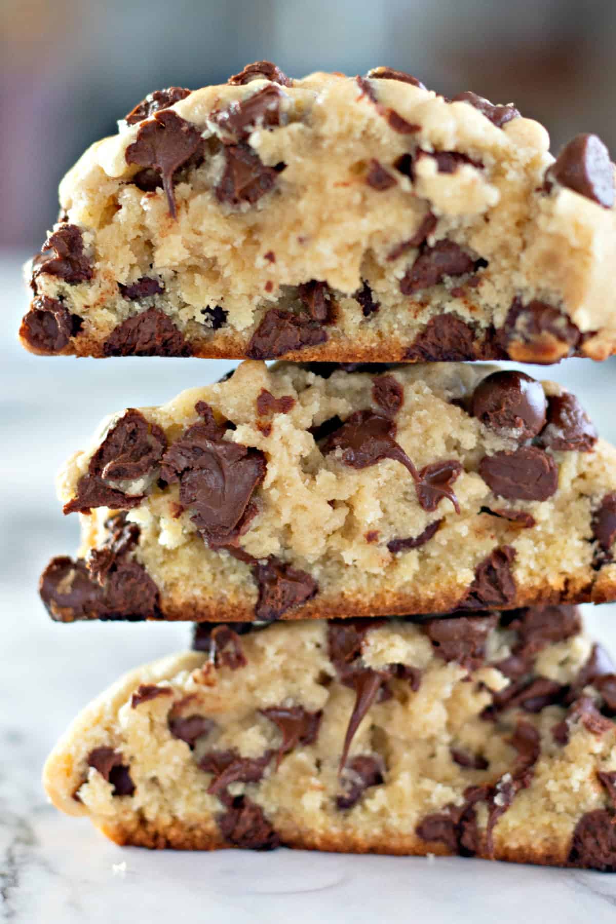 Thick Chocolate Chip Cookies cut in half and stacked