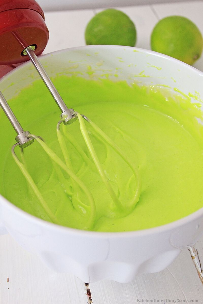 green cake batter in a white bowl