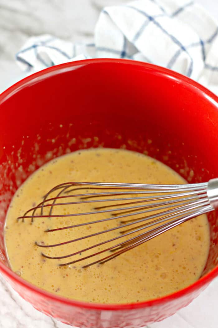Whisking together eggs and heavy cream