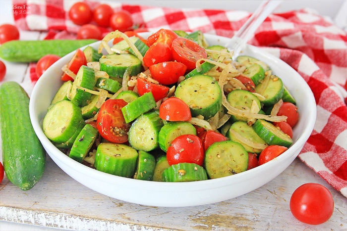 Cucumber Tomato Salad is a simple summer side dish loaded with flavor and healthy veggies. It's topped with an easy homemade Italian dressing.