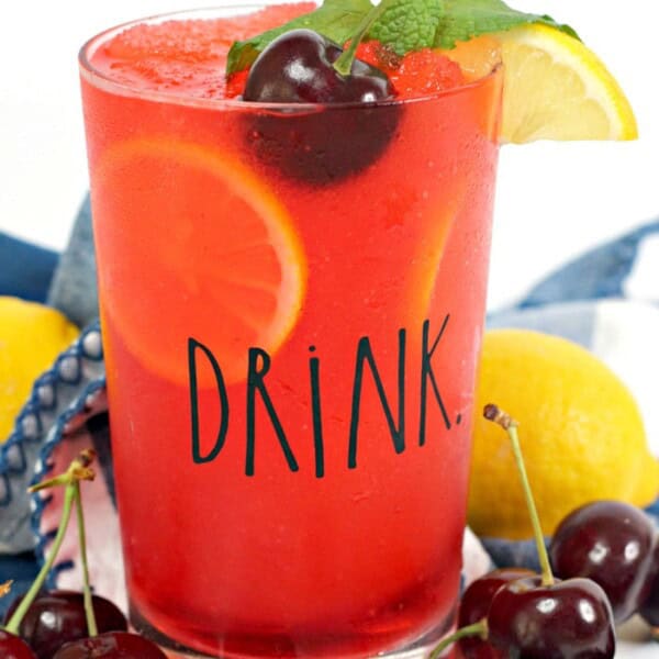 Black Cherry Cocktail with rum, vodka and cherries. A super simple and tasty drink recipe for the grown-ups to enjoy this summer.