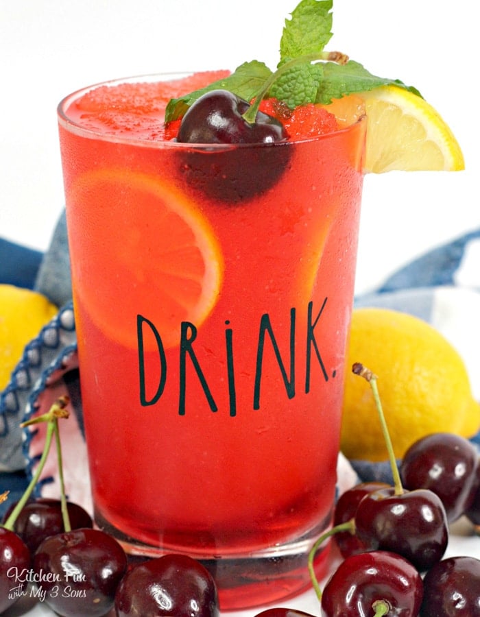 Black Cherry Cocktail with rum, vodka and cherries. A super simple and tasty drink recipe for the grown-ups to enjoy this summer.