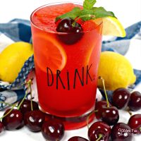 Black Cherry Cocktail with rum, vodka and cherries. A super simple and tasty drink recipe for the grown-ups to enjoy this summer.