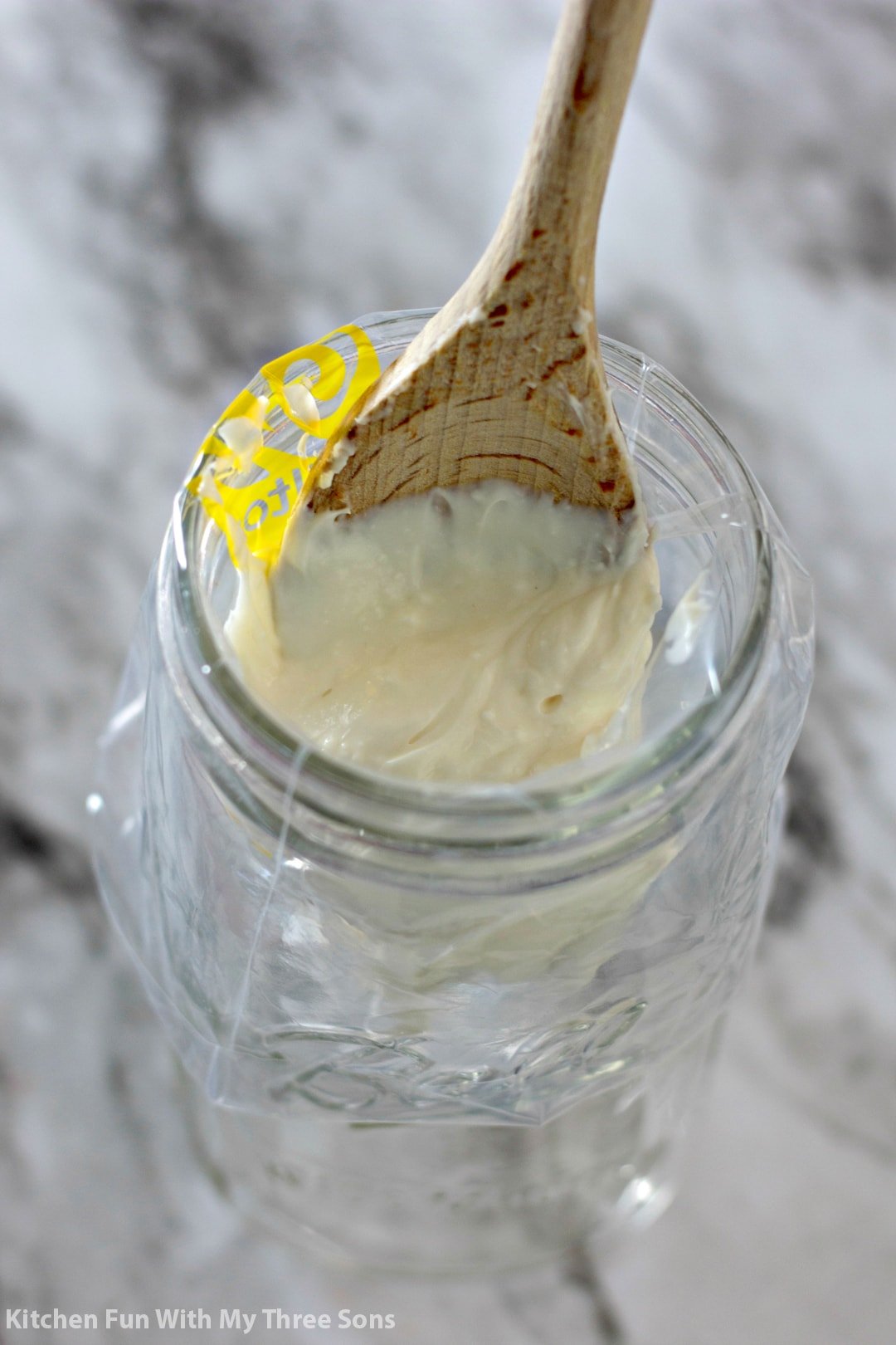 filling a piping bag with no bake whipped cheesecake