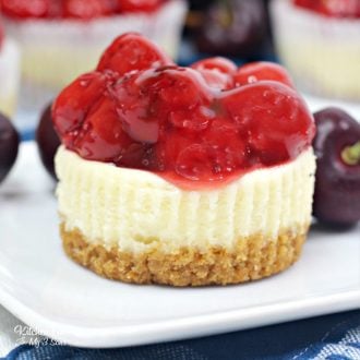 Cherry Cheesecake Cupcakes with a yummy graham cracker crust and creamy cheesecake is delicious. It's a tasty dessert that looks so pretty and is super easy to make.