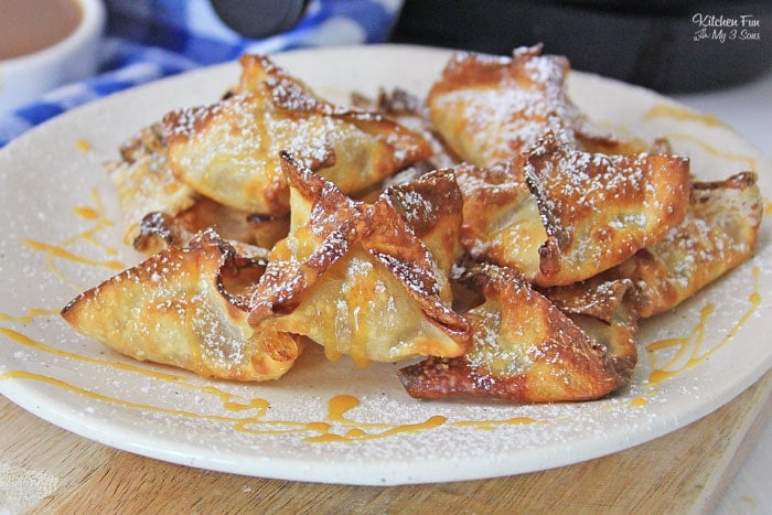 Apple Pie Wontons in the Air Fryer are my new favorite dessert! Just a handful of ingredients make this apple and caramel sweet treat that my family is devouring.