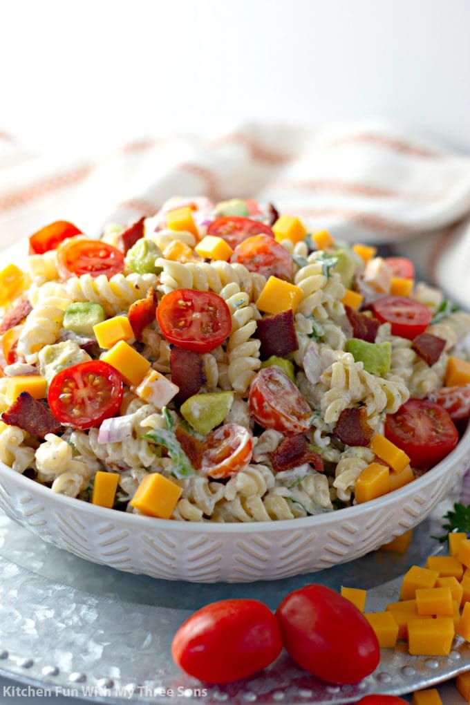 BLT Pasta Salad Recipe in a white bowl on a metal platter