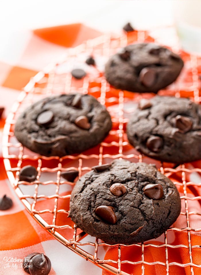 Double chocolate pumpkin cookies on a wire cooling rack.