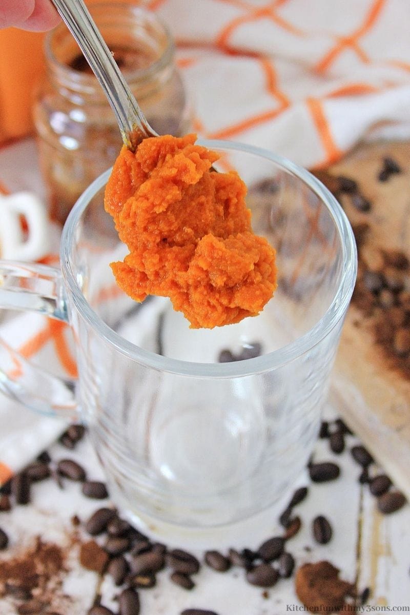 pumpkin being added to a glass