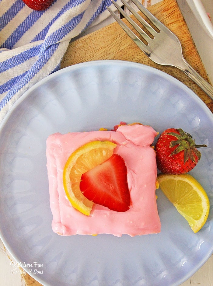 Strawberry Lemon Blondies are buttery soft blondies with the great flavor combination of lemon and strawberries all topped with a yummy cream cheese frosting.