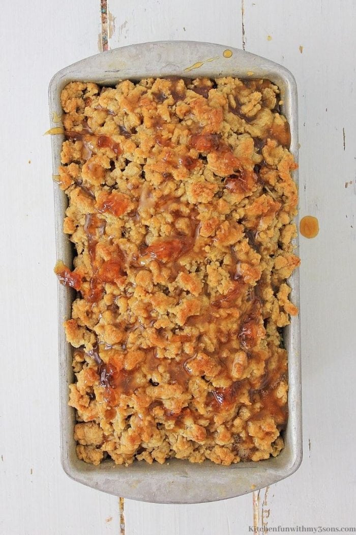 Apple banana bread with streusel topping in a loaf pan