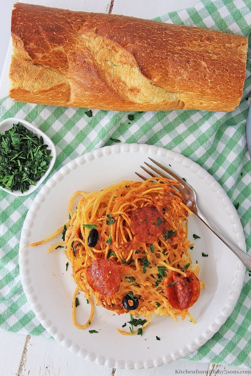 Air Fryer Pizza Pasta Recipe on a serving plate with a side of Italian bread.
