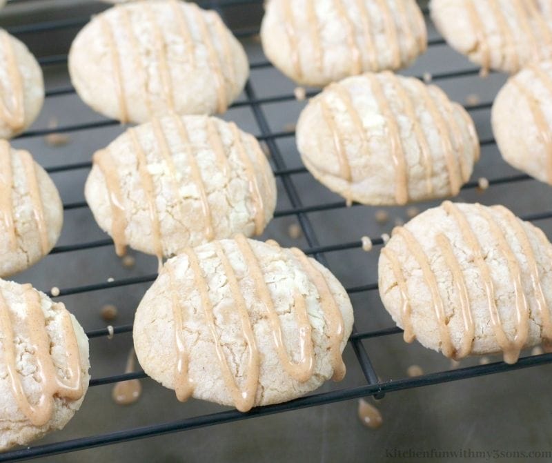 Apple Pie Cookies with Spiced Glaze sitting on a cooling rack