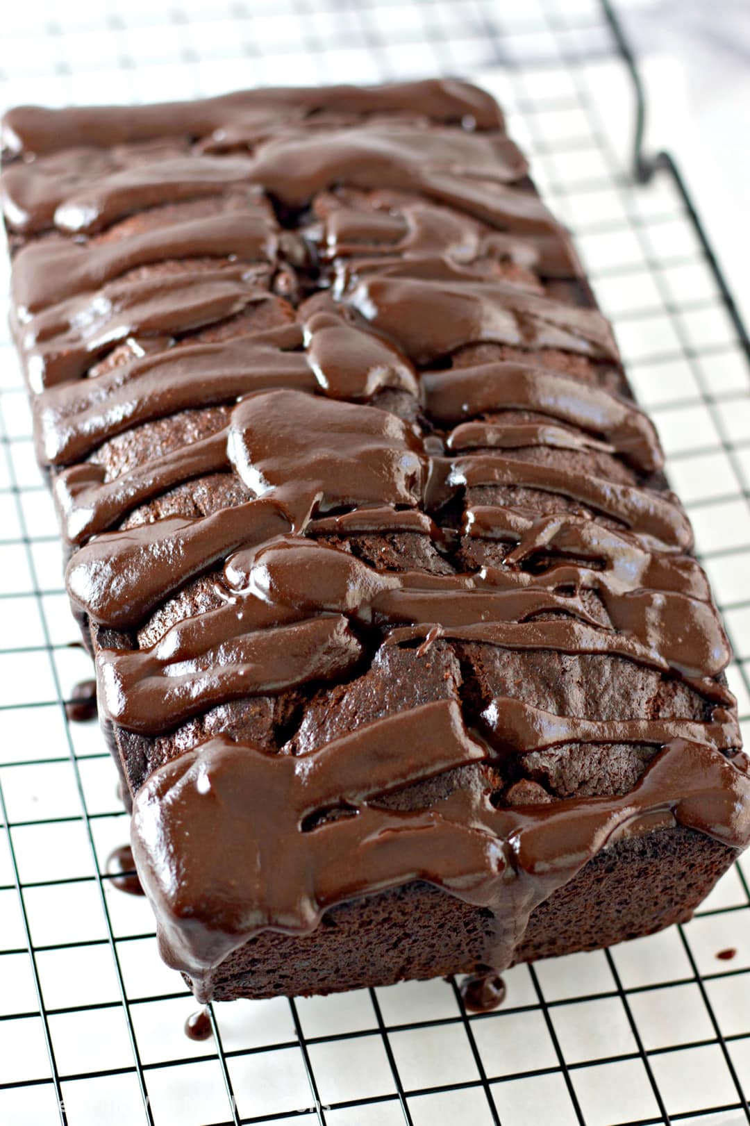 Chocolate Banana Bread on a wire cooling rack