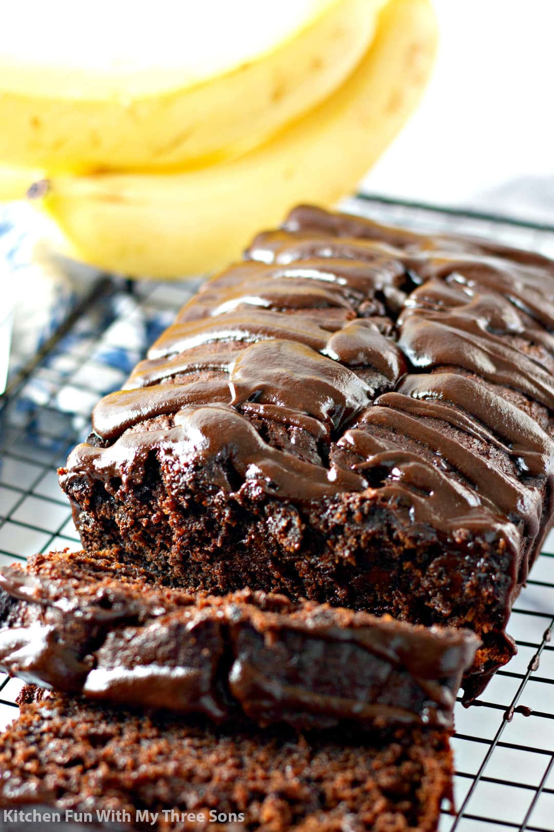 sliced Chocolate Banana Bread on a wire cooling rack