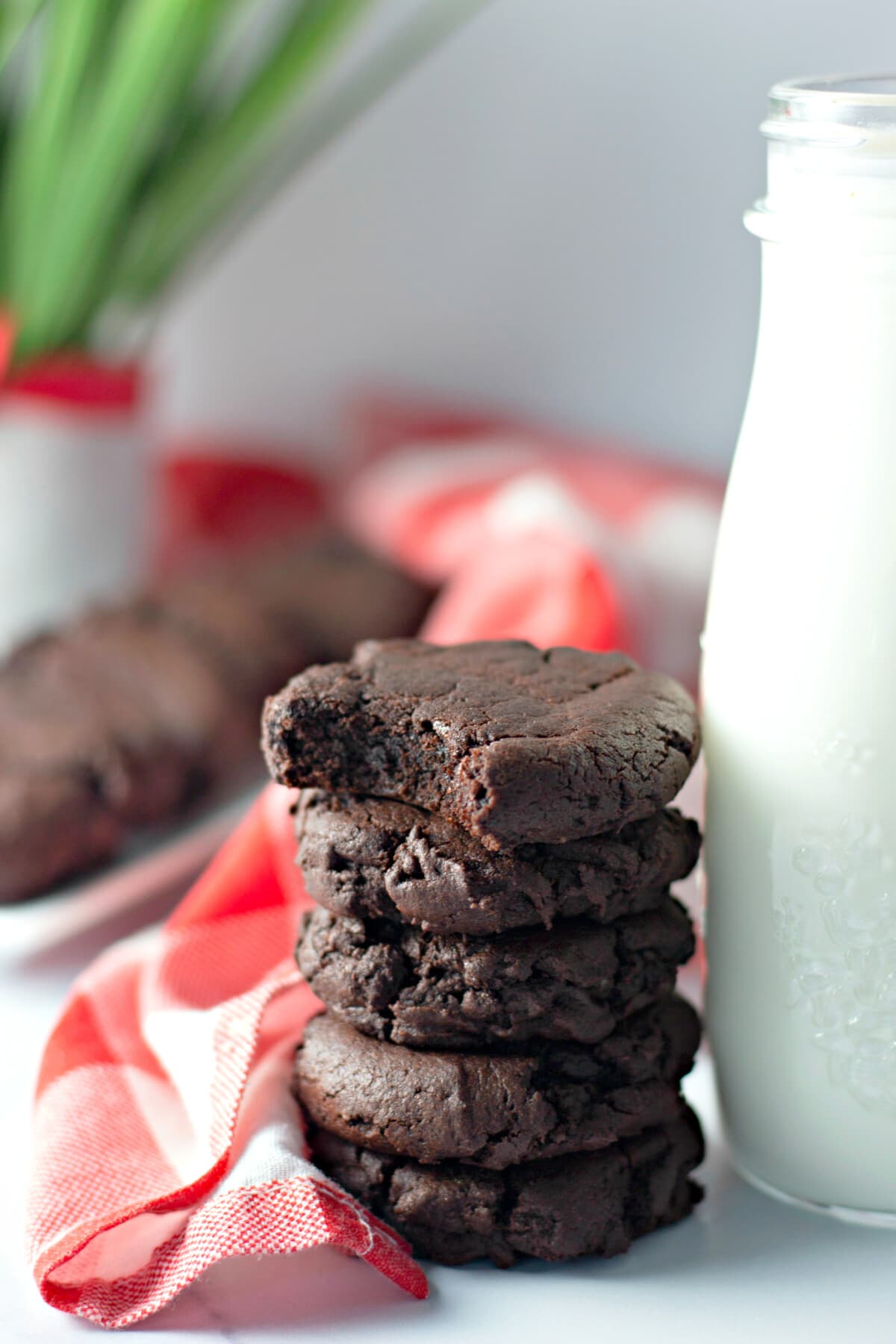 Dark Chocolate Cookies on a white and red cloth.