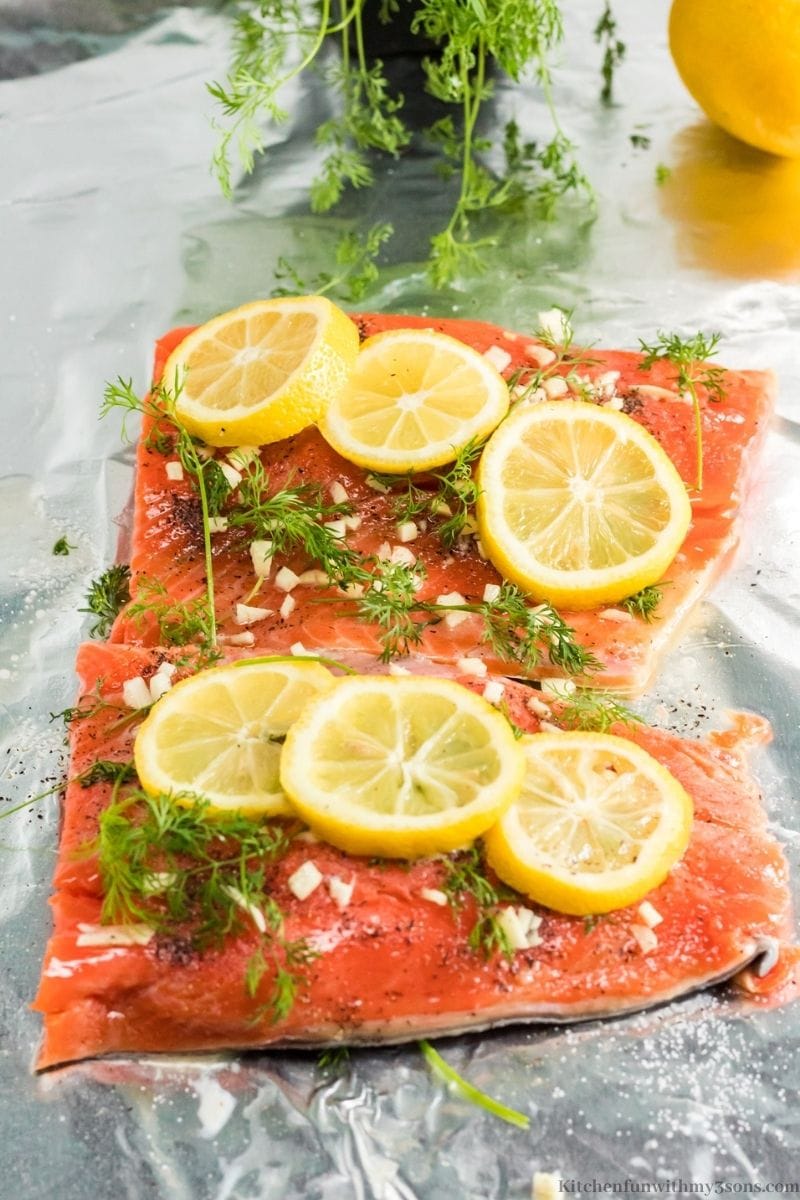 The complete and prepared salmon with more lemon and dill on top.