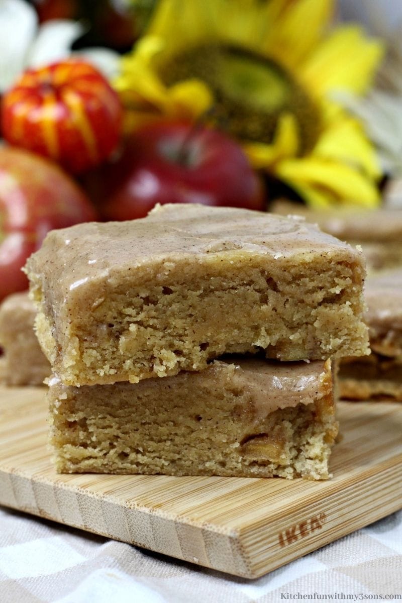 Close up of stacked Pumpkin Apple Blondies with Maple Glaze bars.