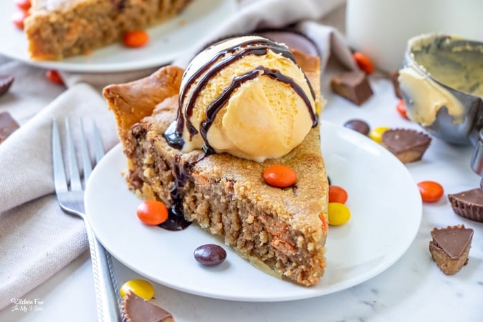 Reese’s Peanut Butter Cookie Pie is every peanut butter lovers dream dessert. This delicious cross between a giant cookie and a pie is full of Reese's pieces and peanut butter cups.