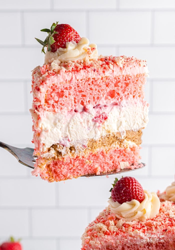 Strawberry Shortcake Cheesecake is quite honestly the best dessert ever made. It's got layers of fresh strawberry cake, white chocolate cheesecake with fresh strawberries and a wafer cookie crumble topping the homemade vanilla frosting. 