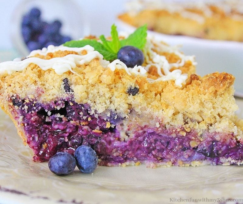 Close up of the Blueberry Muffin Cheesecake Pie with more blueberries.