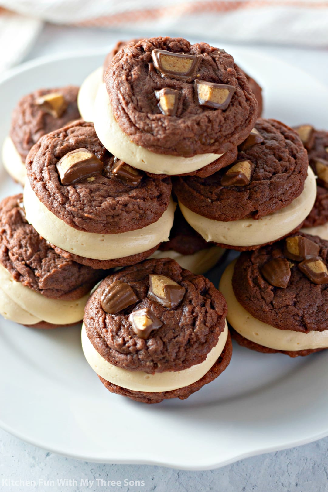 Chocolate Peanut Butter Cup Sandwich Cookies on a white plate